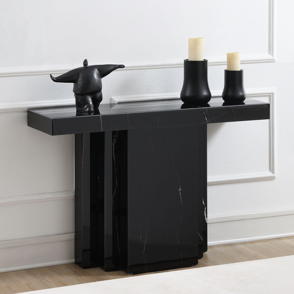 Drisana collection console table and accent mirror exudes modern elegance with its sleek black mirrored finish and marble grain design. This sophisticated pair adds a touch of luxury to any entryway or living space, providing both style and functionality.