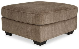 Kick back in style with this oversized accent ottoman. Taking neutral to a new level, the heavy textured chenille upholstery in teak brown is sure to blend beautifully into your scene. Its firmly cushioned design makes it ideal as a coffee table alternati