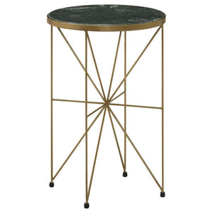A stunning blend of contemporary elegance and classic sophistication, this round accent table adds a luxurious touch to any space. Featuring a solid green marble tabletop, inset within a warm antique gold-finished metal frame, this piece exudes refined gl