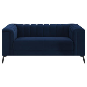  wrapped in a bold navy blue matte velvet. Each piece features a tight waterfall benc