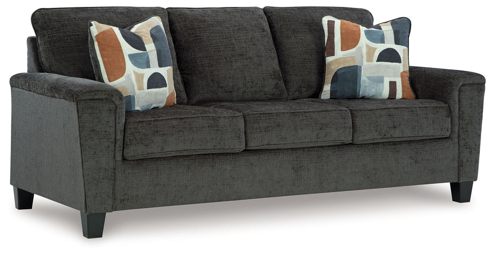 Thereâ€™s something about this sofa thatâ€™s so easy to appreciate. Maybe itâ€™s the plush upholstery and soothing tone, eager to support your quest for total relaxation. Perhaps it-'s the modern flair of its simple lines, tapered legs and abstract-patter