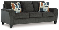Thereâ€™s something about this sofa thatâ€™s so easy to appreciate. Maybe itâ€™s the plush upholstery and soothing tone, eager to support your quest for total relaxation. Perhaps it-'s the modern flair of its simple lines, tapered legs and abstract-patter
