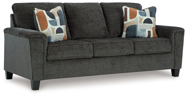 Thereâ€™s something about this sofa thatâ€™s so easy to appreciate. Maybe itâ€™s the plush upholstery and soothing tone, eager to support your quest for total relaxation. Perhaps it-'s the modern flair of its simple lines, tapered legs and abstract-patter