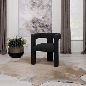  this chair redefines the art of relaxation with its all-fabric design. The seamless transition from the cushioned seat to the curved arms