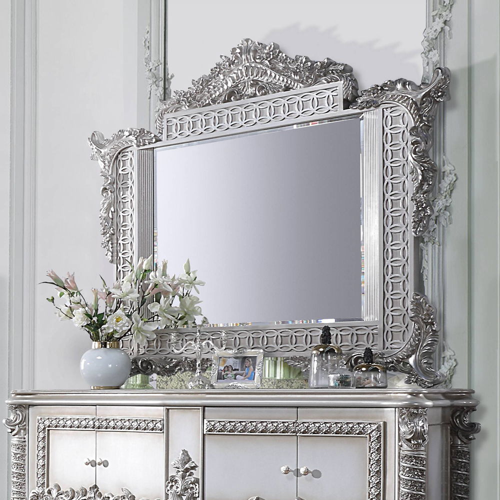 Characterized with button-tufted upholstery, intricate scrollwork, and lustrous finish, the Valkyrie Bedroom Collection provides the feeling of luxury and sophistication. Ornate carvings with floral scroll design on each piece boast extravagant silhouette