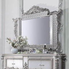 Characterized with button-tufted upholstery, intricate scrollwork, and lustrous finish, the Valkyrie Bedroom Collection provides the feeling of luxury and sophistication. Ornate carvings with floral scroll design on each piece boast extravagant silhouette