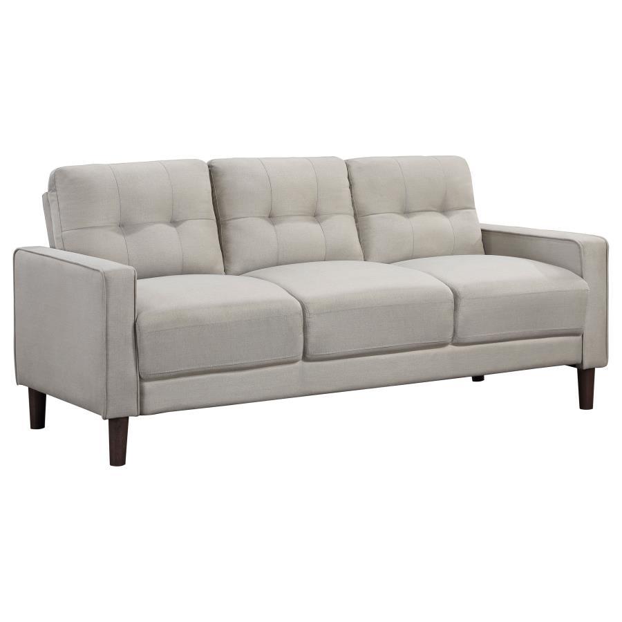 Ideal for studio apartments or small rooms, this sofa boasts a perfect small-scale design. Its classic track arm and self-welt detailing highlight the superior tailoring. The grid-tufted boxed back cushions and pocket coil spring cushion construction ensu