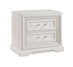 Introducing a bedroom collection that brings a breath of fresh sophistication to any living space. This suite boasts a bright, antique white finish that immediately brightens and opens up a room, providing a versatile foundation for any decor style. The b
