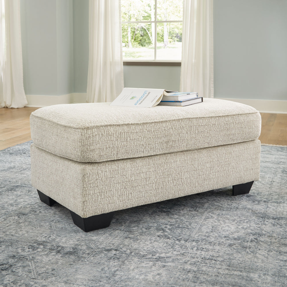 This ottoman has the corner on casual contemporary style and everyday comfort. Chic and subtly innovative, its crosshatched chenille upholstery is a forward-thinking take on fashionable neutrals. This simple, streamlined design is sure to appeal to your r