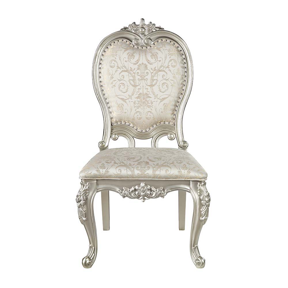 Add traditional glamour to your dining space with the Devayne side chairs. They are as comfortable as they are beautiful with their foam padded seats and backrest. Upholstered in sumptuous jacquard fabric for an added stylish touch. Floral moldings are pr