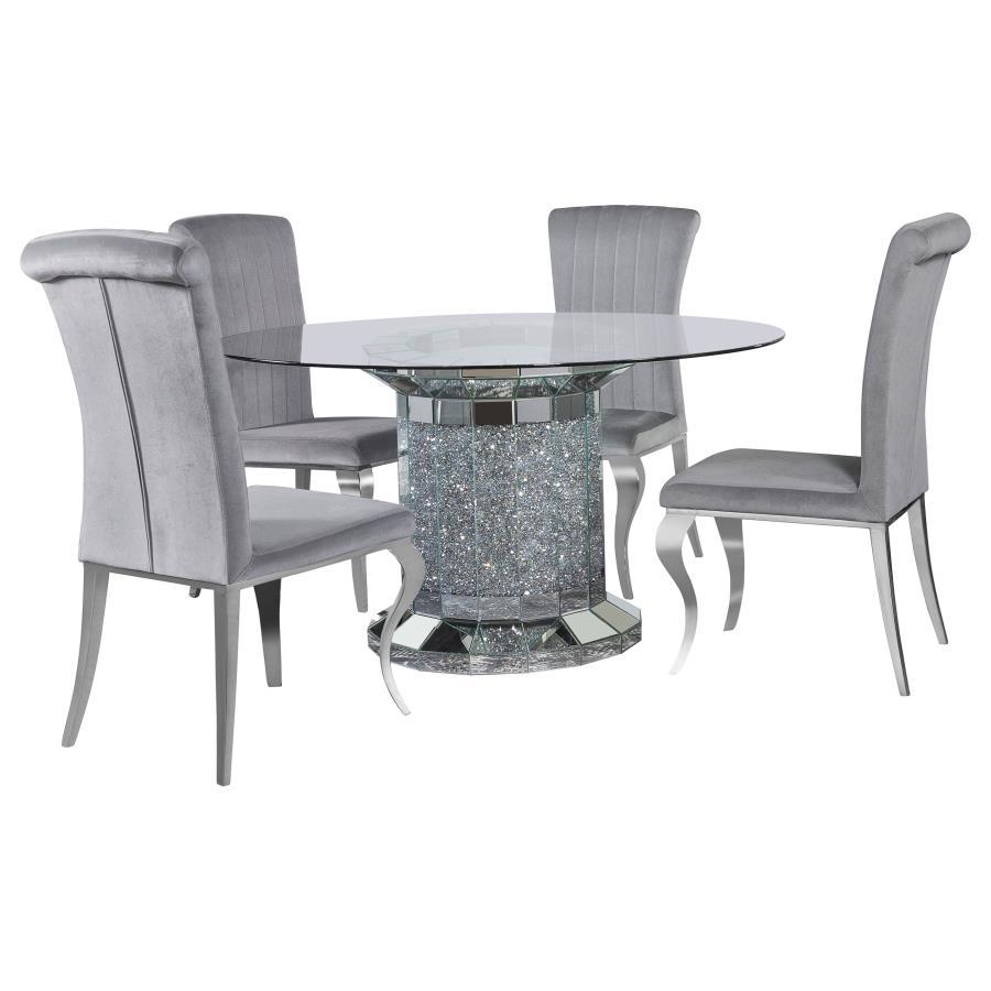 Invite over a few guests to celebrate at this modern glam dining table. A round, clear glass top reveals the scintillating column-inspired pedestal frame beneath, offering an open and airy look. Sparkling faux diamonds are encrusted within the base for a 