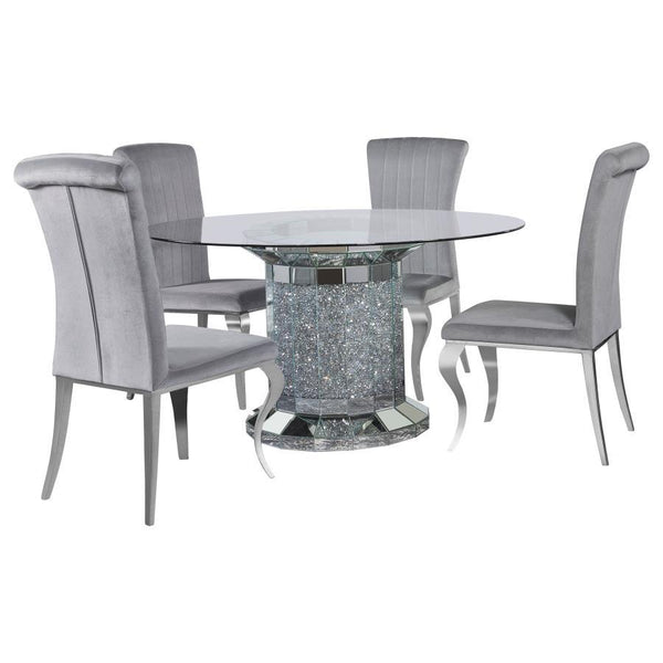 Invite over a few guests to celebrate at this modern glam dining table. A round, clear glass top reveals the scintillating column-inspired pedestal frame beneath, offering an open and airy look. Sparkling faux diamonds are encrusted within the base for a 