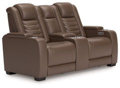 Talk about having it all. This power reclining loveseat with console entices with a luxe look and fabulous feelâ€”and satisfies with high-end style at an affordable price. Sleek and stylish, this impressive seating offers the convenience of one-touch powe