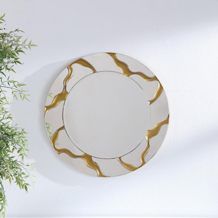 Breathe sophistication into surrounding decor with a modern wall mirror. It boasts a round profile, complete with a center mirror and a mirrored frame. Both are backed by MDF for added durability. The mirrored frame is enhanced with rivers of gold, creati