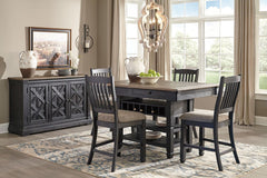 Unique two-tone finish with a combination of Oak and Acacia substrates combining a trendy textured antique black color with table and server tops finished in a textural weathered oak finish. Rectangular dining table features six convenient drawers for sto