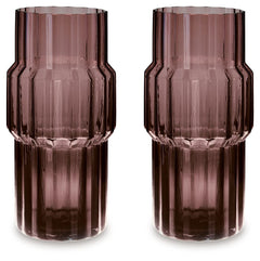 This vase, made of dark mauve-tinted glass, adds a captivating touch to indoor or outdoor decor. Its unique textured shape and oversized fluted details create an elegant art piece. Whether it-'s accentuating flowers or candlelight, this vase is simply str