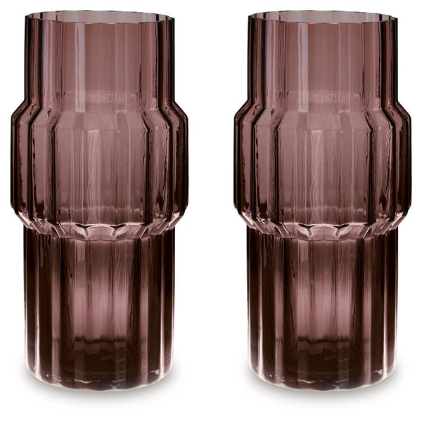 This vase, made of dark mauve-tinted glass, adds a captivating touch to indoor or outdoor decor. Its unique textured shape and oversized fluted details create an elegant art piece. Whether it-'s accentuating flowers or candlelight, this vase is simply str
