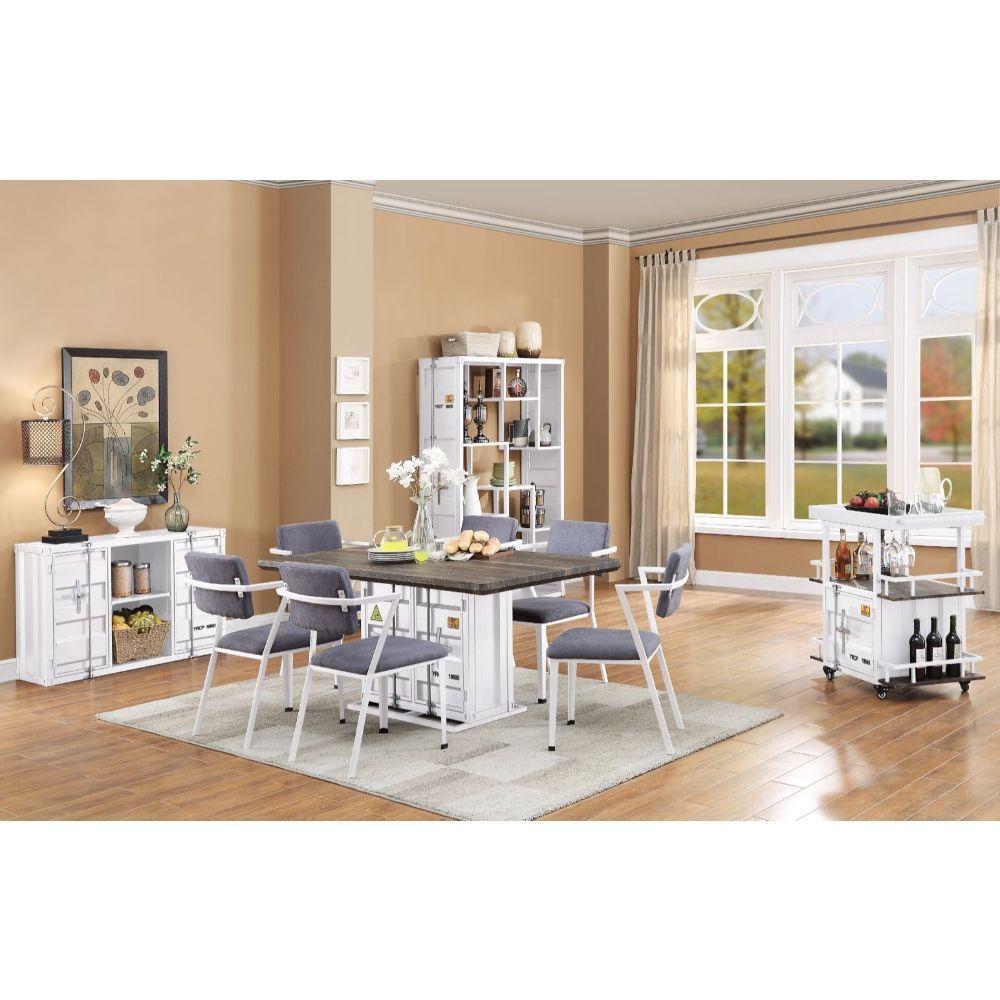 Anchor your dining space in effortless style with the Cargo dining collection. The impressive design elements mix contemporary and industrial themes into one impressive transitional look. The unique rectangular table features a pedestal base with two door