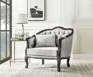 With a nod to vintage French design, the Samael is a modern interpretation of a camel-back sofa is distinguished by its exposed, and beautifully carved, wooden frame that wraps you in comfort. Its curved frame with a winding front rail sits off the floor 