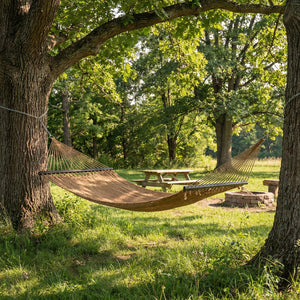 Spacious bed surface comfortably fits 2 people side-by-side<br>Supports up to 600 lbs for secure double lounging<br>Hardwood spreader bars keep hammock flat and stable<br>Countersunk holes reduce rope friction for durability<br>Reinforced triangular rope 