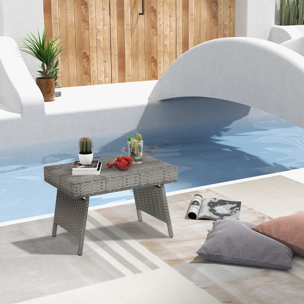 This brown gradient coffee table is made out of durable  weather-resistant resin and an open-weave material  which will not fray and can tolerate high summer temperatures. Â   Their contemporary design and ergonomic comfort are exactly the right combinati