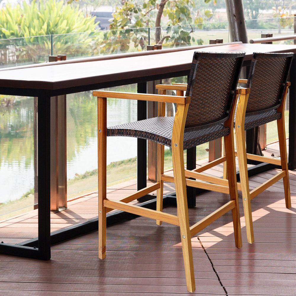 Acacia wood frame is solid and natural<br>High-grade PE rattan for more elegance and durability<br>Comfortable to sit with curved seat and backrest<br>X-shaped metal frame improve stability<br>Adjustable footpads make the bar chairs stand more stably<br>S
