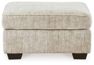  the plush upholstery and dark tri-block legs are a natural complement for so many color