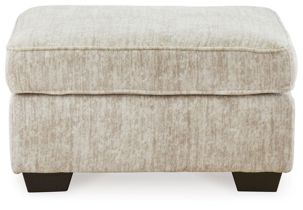  the plush upholstery and dark tri-block legs are a natural complement for so many color
