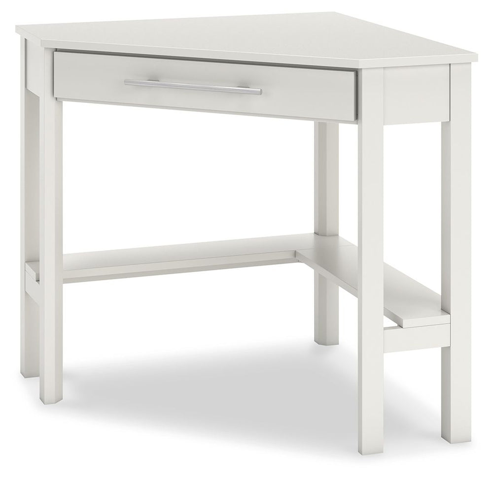 Clean-lined design takes center stage with the Otaska home office corner desk. Well-suited to small spaces, this desk leaves a small footprint as it seamlessly fits into corners. A center storage drawer keeps essentials close, while the crisp white finish