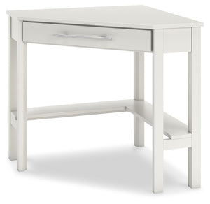  this desk leaves a small footprint as it seamlessly fits into corners. A center storage drawer keeps essentials close