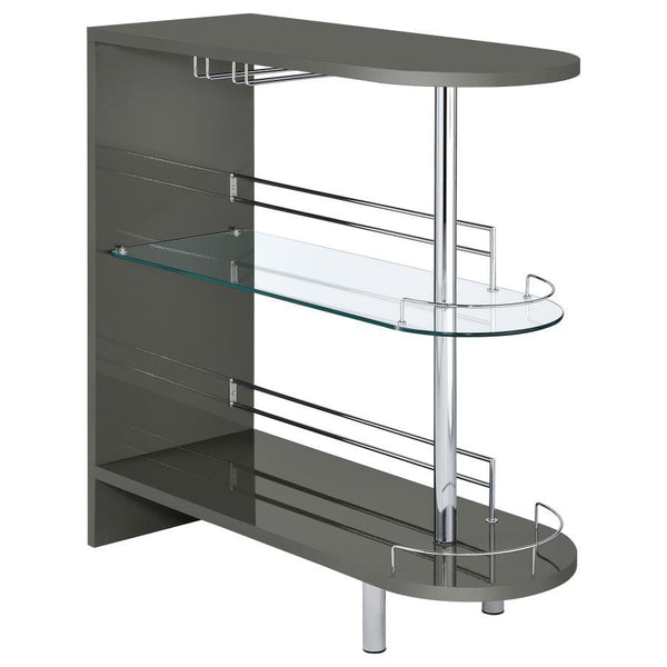 Add a fun retro feel to a modern living area with this contemporary bar table. In a glossy grey finish, the silhouette is cool and neutral. Tempered glass storage shelves offer a clean and open feel while displaying libation bottles in style. Included gua