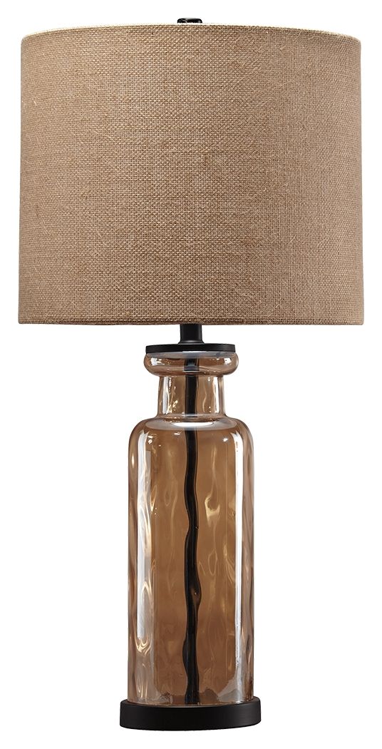 Transparency is in style with this table lamp. A unique pattern reflects in the faceted base as light passes through. Antique bronze-tone metal beautifully complements the champagne glass finish. Burlap shade adds texture to the smooth design.<br><br><b>A