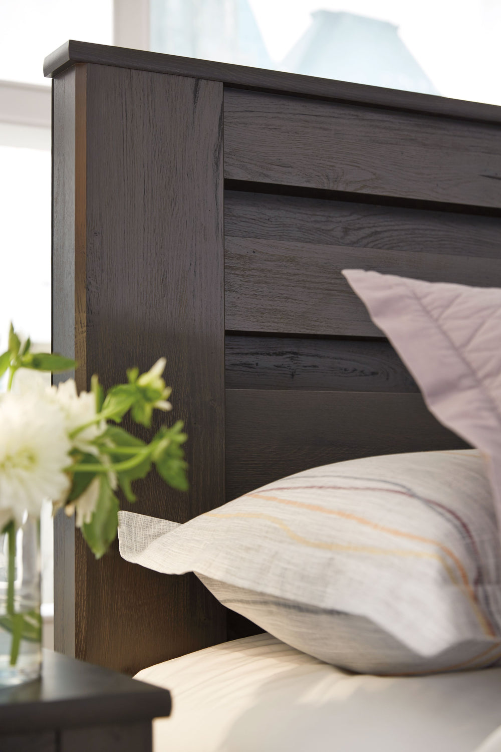 Priced to entice and styled to impress, this alluring full bed is urban sophistication with a decidedly relaxed air. Itâ€™s got the crisp, clean lines of a contemporary piece, but with an earthy element. Deep, horizontal grooves infuse depth and dimension