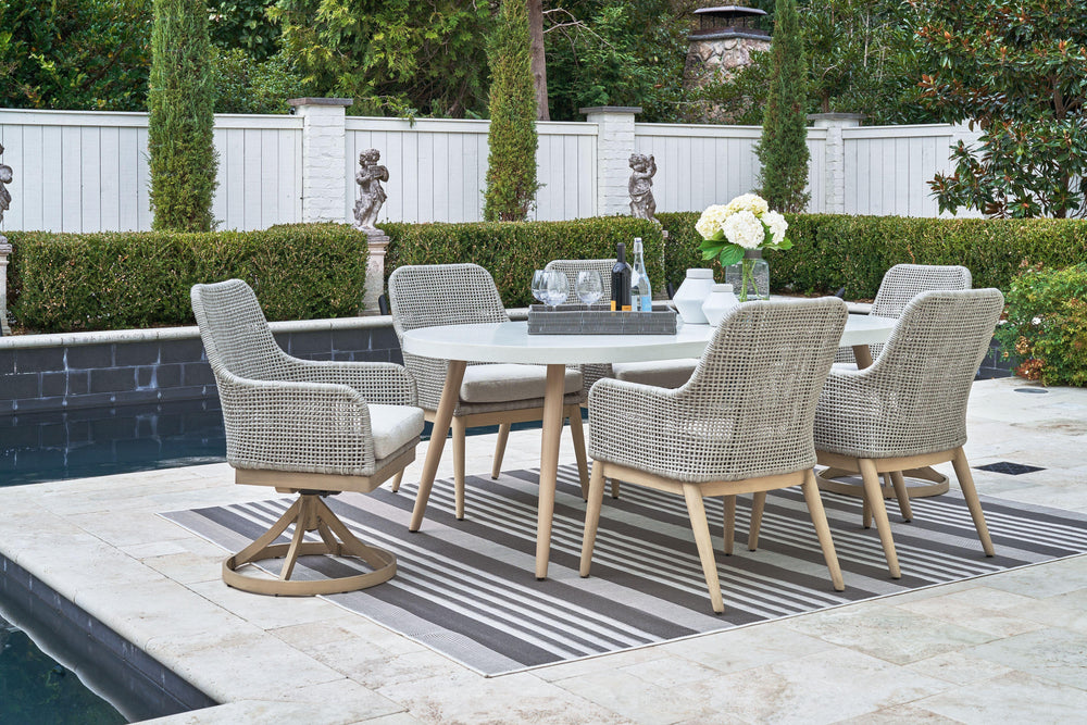 This set is a beautiful addition to any outdoor living space. Resin wicker on an aluminum frame. Wood look paint finish. Nuvella premium high performance fabric. Tempered glass top tables. Stainless steel hardware. <h4><b>Seton Creek - White - Oval Dining