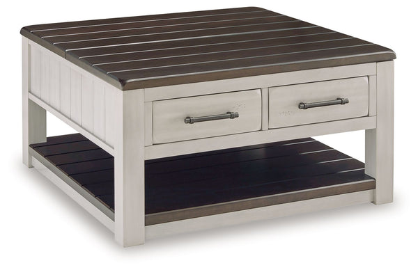 Make a farmhouse-inspired statement with this coffee table. Beautifully crafted to stand the test of time, the planked look and clean two-tone finish lend a relaxing vintage feel. A clever lift-top section and spacious storage drawers double up on form an