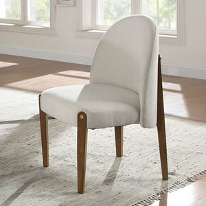 The Gamarya dining collection is designed to provide space for your guests in effortless convenience and tasteful style. This dining collection offers a contemporary vibe to your dining space. The oval tabletop and vertical reeding on the pedestal base le