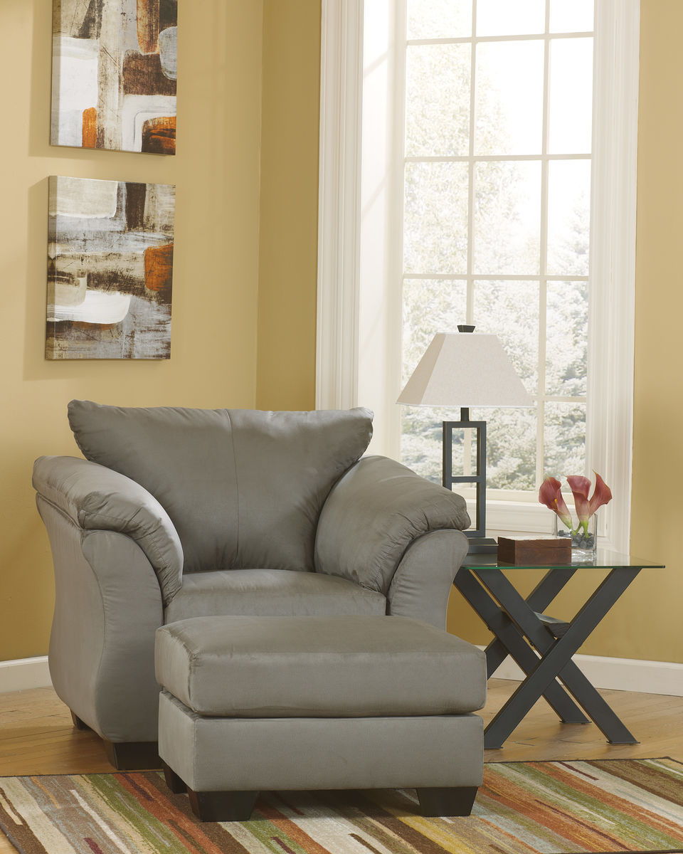 For a fresh spot in your space, turn to this designer chair and ottoman. Wind down at the end of a long day when you sink into this canyon of comfort. <h4><b>Darcy - Cobblestone - Chair</b></h4> <table width=-"100%-"><colgroup><col style=-"width: 30%