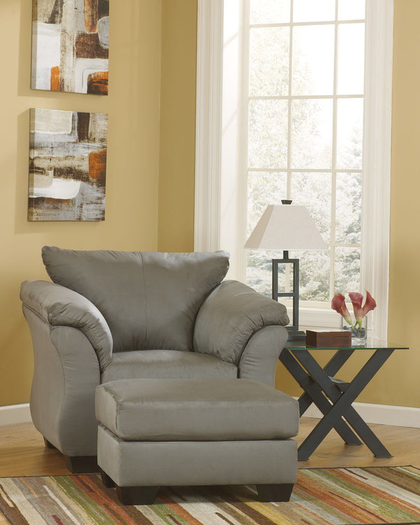 For a fresh spot in your space, turn to this designer chair and ottoman. Wind down at the end of a long day when you sink into this canyon of comfort. <h4><b>Darcy - Cobblestone - Chair</b></h4> <table width=-"100%-"><colgroup><col style=-"width: 30%