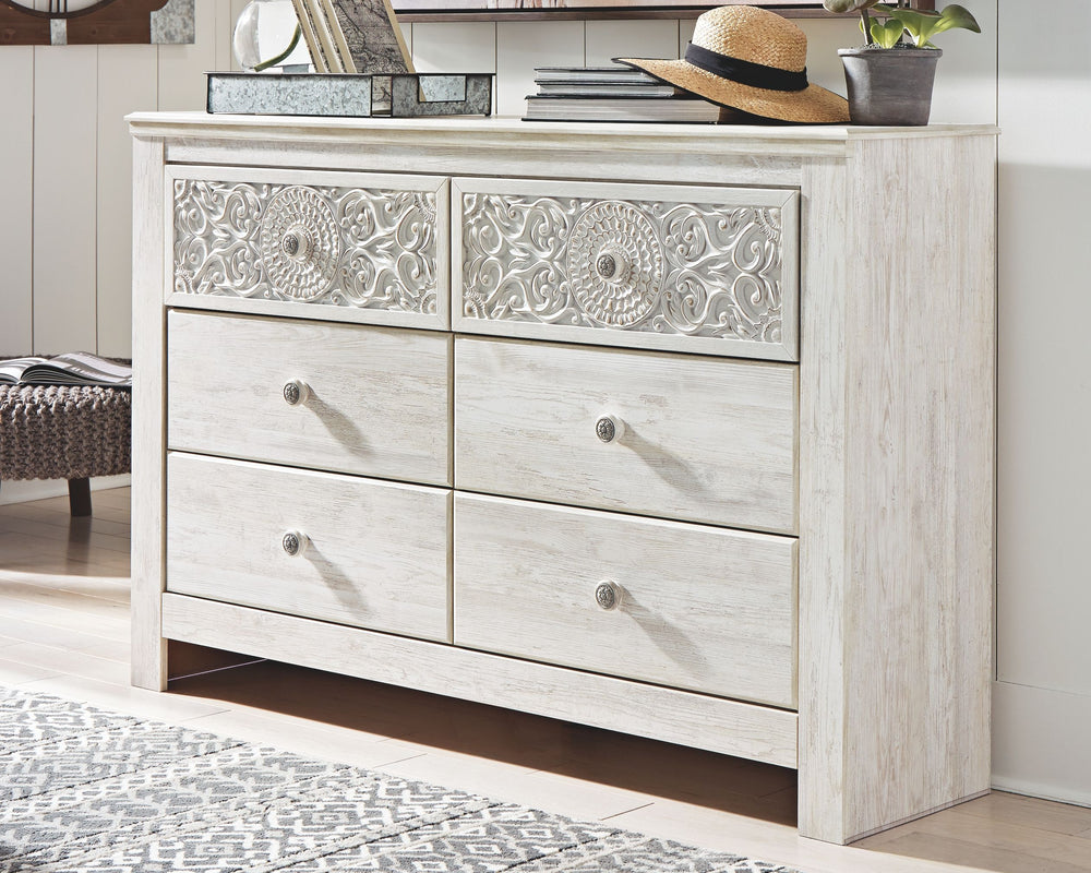 If itâ€™s coastal chic or cottage quaint style you long for, this whitewashed dresser invites you to go to town. Its distinctive weatherworn finish conveys an easy-breezy sensibility, perfect for a restful bedroom retreat. Tastefully edited lines and meda