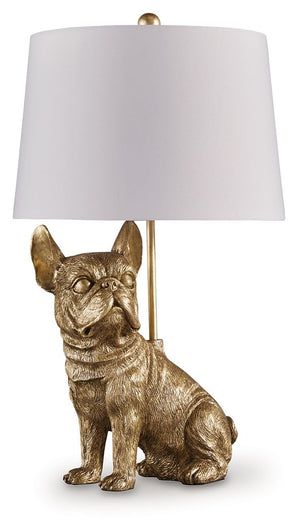 This charming table lamp brings a touch of playful sophistication to your home. An adorable French bulldog base, finished in a sleek goldtone, is sure to be a conversation starter. This lamp-'s warm and inviting ambiance makes it a delightful addition to 