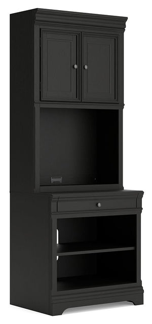 Make a style statement with this home office bookcase. Its traditional design is updated with an on-trend vintage black finish. A hutch with LED underlighting shines a light on those elusive reading glasses and other desktop items. The bookshelf, drawer a