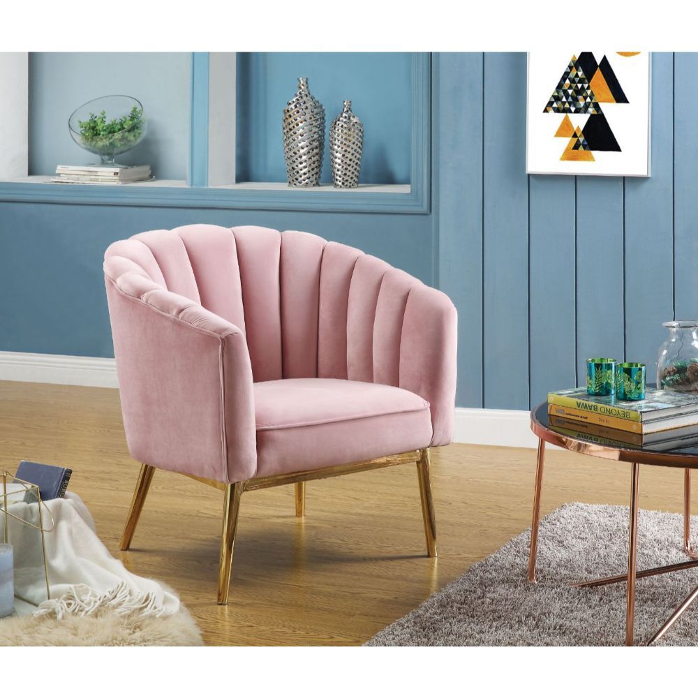 Refined carving with authentic styling, the Colla accent chair is the embodiment of elegance. The thick padded velvet cushion with straight-lined detailing offers superior coziness. Available in pink and blue velvet cushion it is ideal for reading a book 