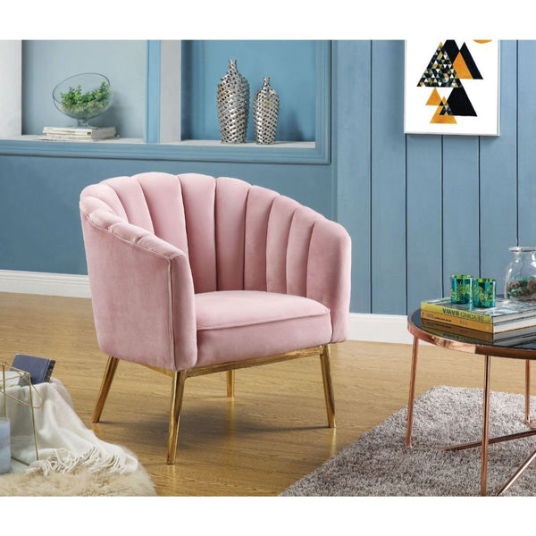 Refined carving with authentic styling, the Colla accent chair is the embodiment of elegance. The thick padded velvet cushion with straight-lined detailing offers superior coziness. Available in pink and blue velvet cushion it is ideal for reading a book 