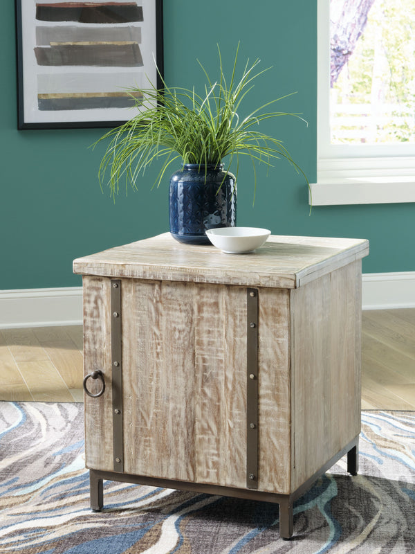  this accent cabinet tells a story with its unique markings and tonal variation. The antiqued brown hardware against reclaimed wood has a charming flair