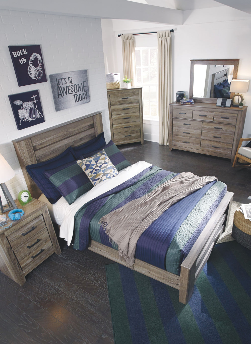 Warm gray sophisticated vintage finish with white wax effect over replicated oak grain. Tall generously scaled cases with wide pilaster, finished off with gently curved foot. Large dark pewter color handles with an aged appearance accent cases. Modern sty