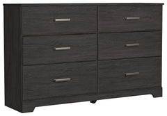 With its clean-lined look and modern attitude, this dresser is a fresh style awakening. A warm charcoal hue over replicated oak grain easily complements other furniture finishes. Smooth drawer fronts with antiqued pewter-tone handles complete the aestheti