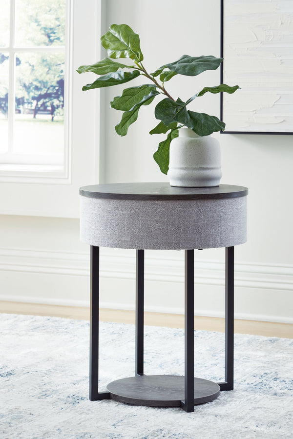  this accent table wows with subtly integrated functional features. Wirelessly connect your audio to its built-in speakers as you host guests or relax solo. Need to charge up as you lounge? Place it next to your sofa t
