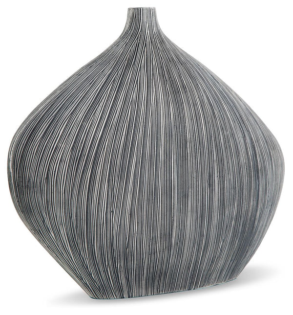  curved shape. Itâ€™s an ideal accessory for your curated approach to casual design.<br/><br/><b>Product Features</b><ul><li>Made with polyresin</li><li>Anti