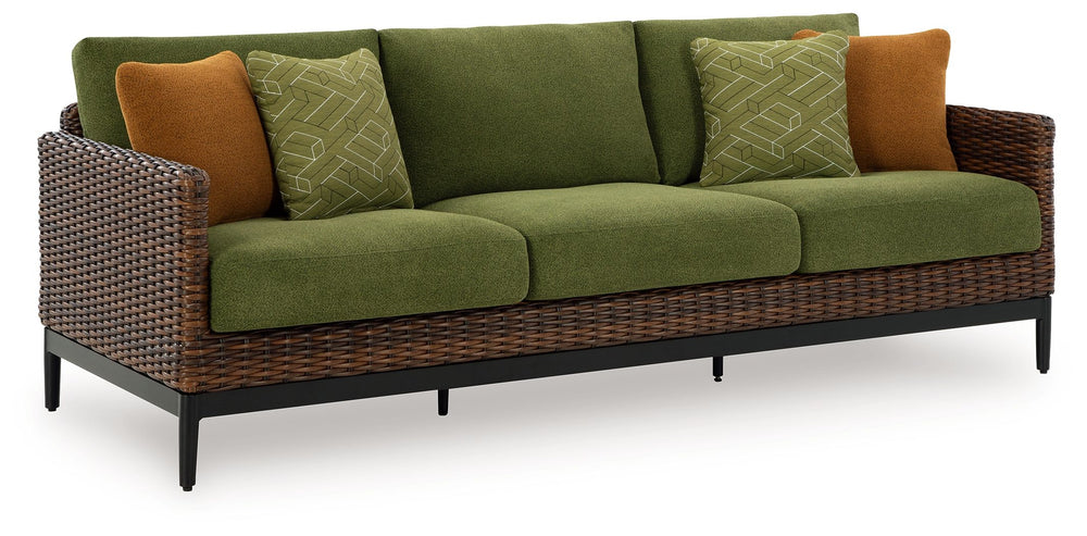 This outdoor sofa recalls the aesthetics of nature to bring an inviting, high-style feel to your patio or lanai. Its Nuvella+â„¢ performance fabric is made with enhanced UV resistance, so the chic green hue stays brighter for longer. Worried about the wea