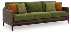 This outdoor sofa recalls the aesthetics of nature to bring an inviting, high-style feel to your patio or lanai. Its Nuvella+â„¢ performance fabric is made with enhanced UV resistance, so the chic green hue stays brighter for longer. Worried about the wea